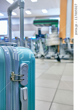 Suitcase or baggage with airport luggage trolley in the international airport, focus on suitcases. Vacation concept 117885027
