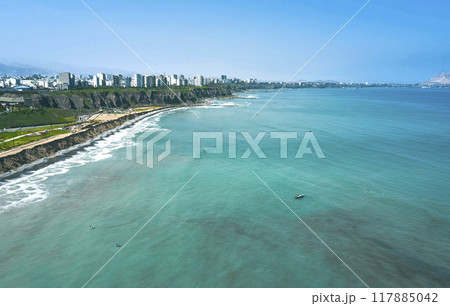 Scenic view of traditional fishing boats in the bay of Lima, Peru. Self-sustaining concept 117885042