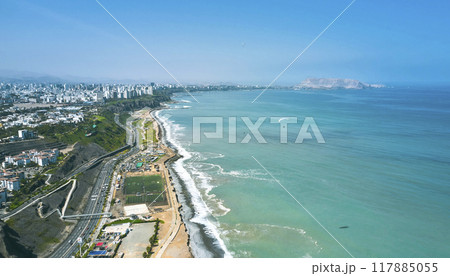 Aerial view of the Great Bay of Lima, cliff and the Costa Verde high way. 117885055