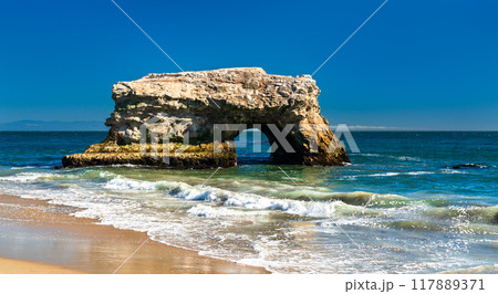 Arch in the sea at Natural Bridges State Beach in Santa Cruz - California, United States Arch in the sea at Natural Bridges State Beach in Santa Cruz - California, United States 117889371