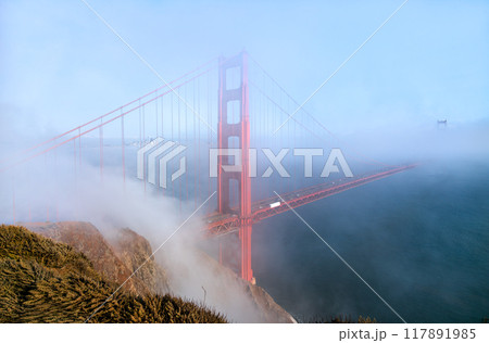 Golden Gate Bridge Shrouded in Mystical Fog Overlooking the Bay in San Francisco - California, United States 117891985
