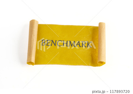 Business concept of benchmark. A word BENCHMARK written on paper, a mustard-colored note on a white background 117893720