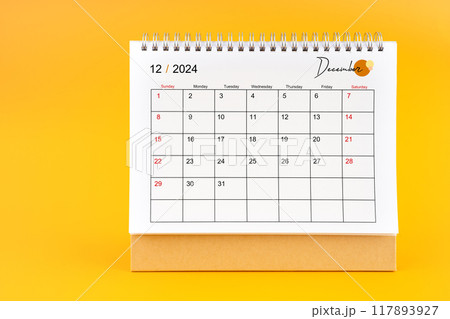 December 2024, Monthly desk calendar for 2024 year on yellow background. December 2024, Monthly desk calendar for 2024 year on yellow background. 117893927