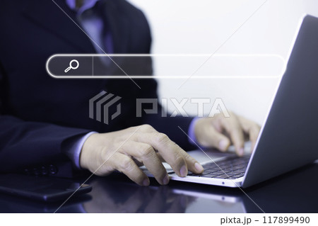 Technology Search Engine Optimization Concept . Businessman click Internet Data Search Engine. Internet browsing Information network concept. Hand is using laptop to find information using Search. Technology Search Engine Optimization Concept . Businessman click Internet Data Search Engine. Internet browsing Information network concept. Hand is using laptop to find information using Search. 117899490