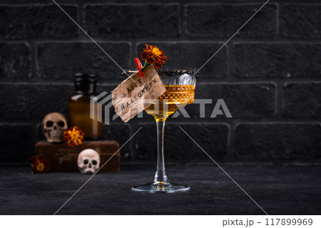 Halloween cocktail orange pumpkin martini Halloween cocktail orange pumpkin martini 117899969