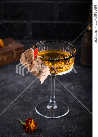 Halloween cocktail orange pumpkin martini 117899984