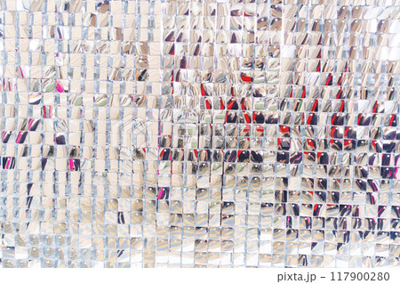 A wall with silver sequins to decorate the interior.  117900280