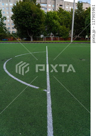 A sweep at the football goal at the school stadium. Football field A sweep at the football goal at the school stadium. Football field 117905961