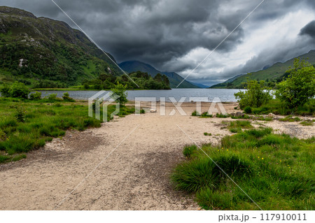 Sandy Beach Of Lake Loch Shiel At Glenfinnan Monument On The Road To The Isles In Lochaber In Scotland, UK 117910011