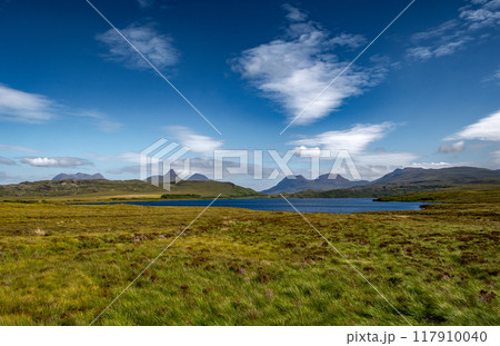 Rural Landscape With Lake Loch Osgaig Near Achnahaird In The Highlands Of Scotland, UK 117910040