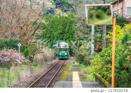 Yufuin No Mori train run on railway through Bungo Nakagawa station Yufuin No Mori train run on railway through Bungo Nakagawa station 117910258