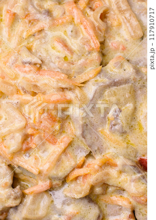 Delicious boiled beef or pork tongue sliced with carrots, onions, sour cream Delicious boiled beef or pork tongue sliced with carrots, onions, sour cream 117910717