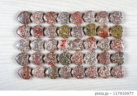 Heart-Shaped Beauty: 40 Leopard Skin Jasper Stones Arranged in Perfect Harmony - Discover the Allure of Natural Patterns in Gemstone Form. Heart-Shaped Beauty: 40 Leopard Skin Jasper Stones Arranged in Perfect Harmony - Discover the Allure of Natural Patterns in Gemstone Form. 117910977