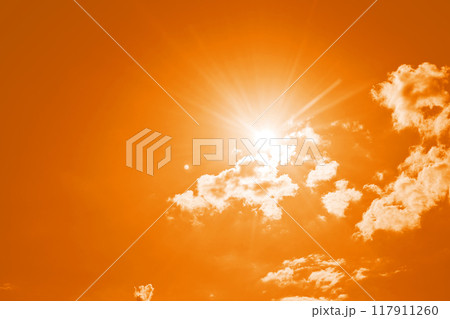 Hot weather. Vivid blue sky with bright sun and scattered white clouds Hot weather. Vivid blue sky with bright sun and scattered white clouds 117911260
