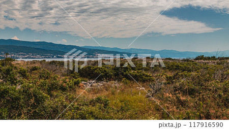 Krk Croatia A view of the mountains and the sea near the Biserujka caves Krk Croatia A view of the mountains and the sea near the Biserujka caves 117916590