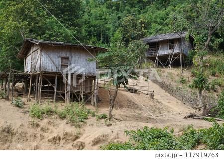 Home of the Moon Tribe, Mindat City, Chin State, where women have their faces tattooed with black ink. Houses are in poor condition, without electricity or running water. Home of the Moon Tribe, Mindat City, Chin State, where women have their faces tattooed with black ink. Houses are in poor condition, without electricity or running water. 117919763
