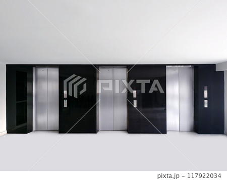 elevator door closed Metal chrome office building elevator real photo 117922034