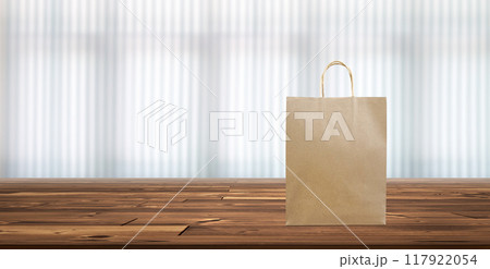 Paper bags, shopping bags on a wooden table, blurred curtain background. 117922054
