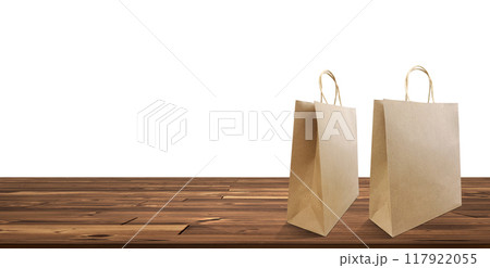 Brown folding paper bag with handle Empty paper bags for buying groceries recycled package. 117922055