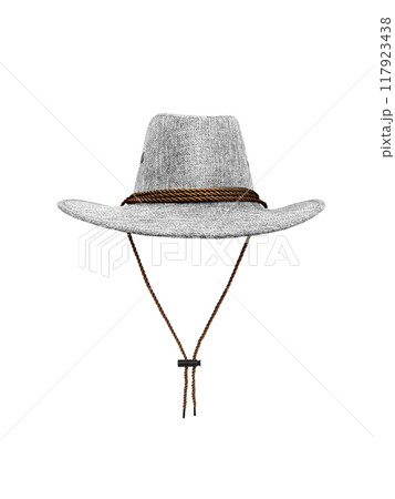 Cowboy style straw hat with rope hanging isolated on white background. Cowboy style straw hat with rope hanging isolated on white background. 117923438