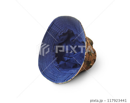 A blue inner camouflage bucket hat lays on a white background. 117923441