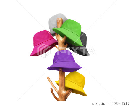Hat hanging on a coat hanger pole Isolated on a white background 117923537