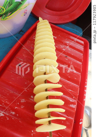 Spiral Fried Potato with stick on shop Spiral Fried Potato with stick on shop 117923985