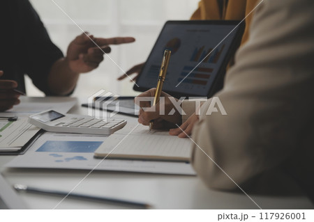 Close up of Business team analyzing income charts and graphs with modern laptop computer. Business analysis and strategy concept. Close up of Business team analyzing income charts and graphs with modern laptop computer. Business analysis and strategy concept. 117926001