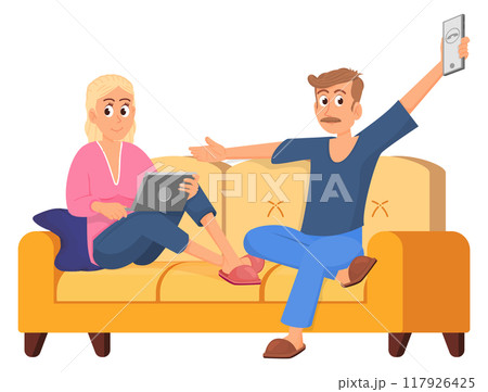 Husband and wife sit on couch. Cozy home evening 117926425