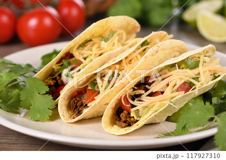 Taco with ground beef, cabbage and cheese Taco with ground beef, cabbage and cheese 117927310