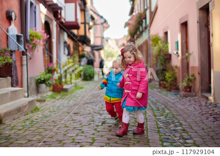 Kids in historical city center in France Kids in historical city center in France 117929104
