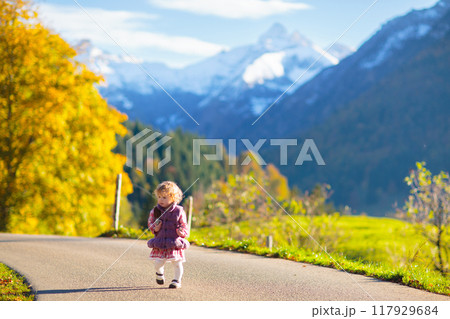 Family with kids hiking in the mountains Family with kids hiking in the mountains 117929684