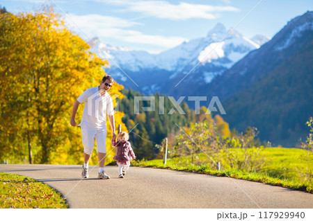 Family with kids hiking in the mountains Family with kids hiking in the mountains 117929940