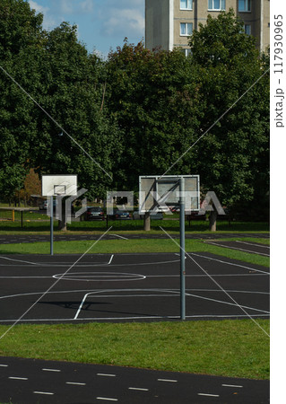 Basketball fields at the school stadium. Basketball Rings Basketball fields at the school stadium. Basketball Rings 117930965