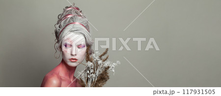 Pretty beautiful woman in carnival Halloween costume, theater actress 117931505