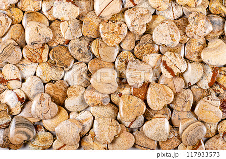 Geological Romance: Picture Jasper Hearts Reveal Earth's Artistry in Captivating Semiprecious Stone Display. 117933573