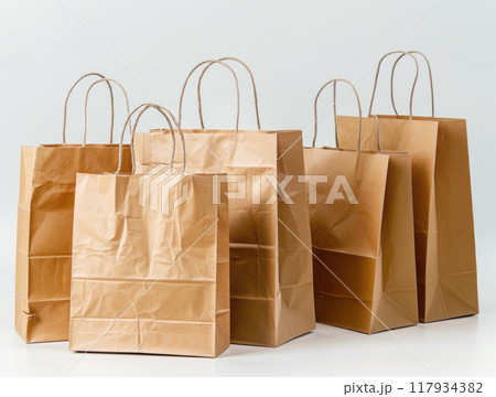 Brown paper shopping bag isolated 117934382
