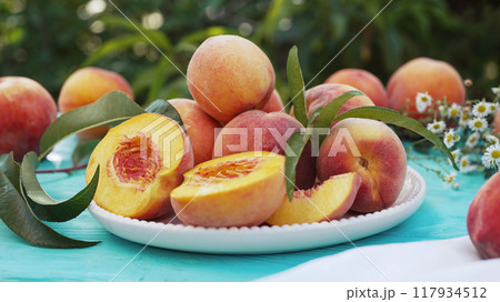 Still life of ripe peaches and nectarine.Healthy harvest from home rustic garden 117934512