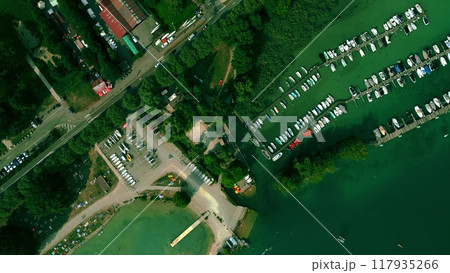 Aerial top down view of Annecy, boat parking at the Plage d'Albigny lake beach and Annecy-le-Vieux area, France 117935266