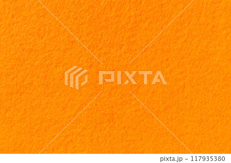 Macro image of felt texture background fabric material illustration wallpaper orange color Macro image of felt texture background fabric material illustration wallpaper orange color 117935380