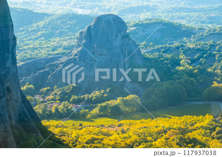 Bizarre Rock with Caves in the Meteora Valley 117937038