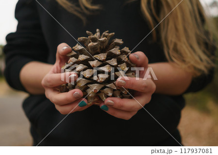 teen girl holding big cone 117937081