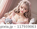くまのぬいぐるみを持ったスウィートロリータファッションの女の子 117939063