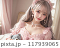 くまのぬいぐるみを持ったスウィートロリータファッションの女の子 117939065