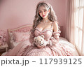 くまのぬいぐるみを持ったスウィートロリータファッションの女の子 117939125