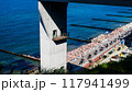 The coastline of the Baltic Sea. The promenade by the beach. Breakwaters built by man to protect the coastal zone. 117941499