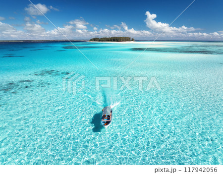 Aerial view of colorful boat, sandbank, blue sea on sunny day 117942056