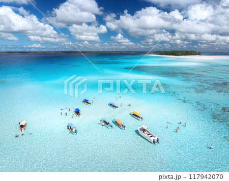 Aerial view of boats in clear azure sea in summer. Top view 117942070