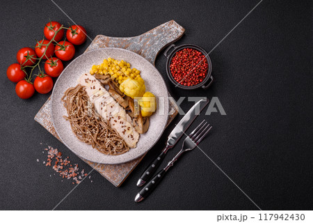Asian dish with sliced chicken fillet, buckwheat noodles, soy sauce Asian dish with sliced chicken fillet, buckwheat noodles, soy sauce 117942430