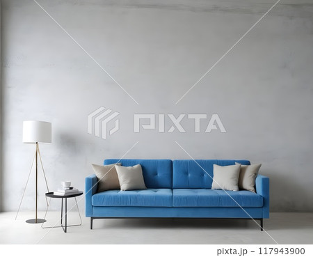 Modern living room with blue sofa, floor lamp, and potted plant in minimalistic design natural light 117943900